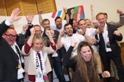 Športovci, politici a úradníci reagujú po oznámení prvých prognóz o výsledku referenda o olympijskej kandidatúre Mníchova.