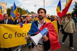 Podporovateľ proeurópskej strany PAS na zhromaždení v Kišiňove.