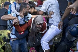 Na snímke migranti v chorvátskej obci Tovarnik.