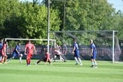 Záber zo stretnutia Komjatice - Veľké Lovce 1:2.