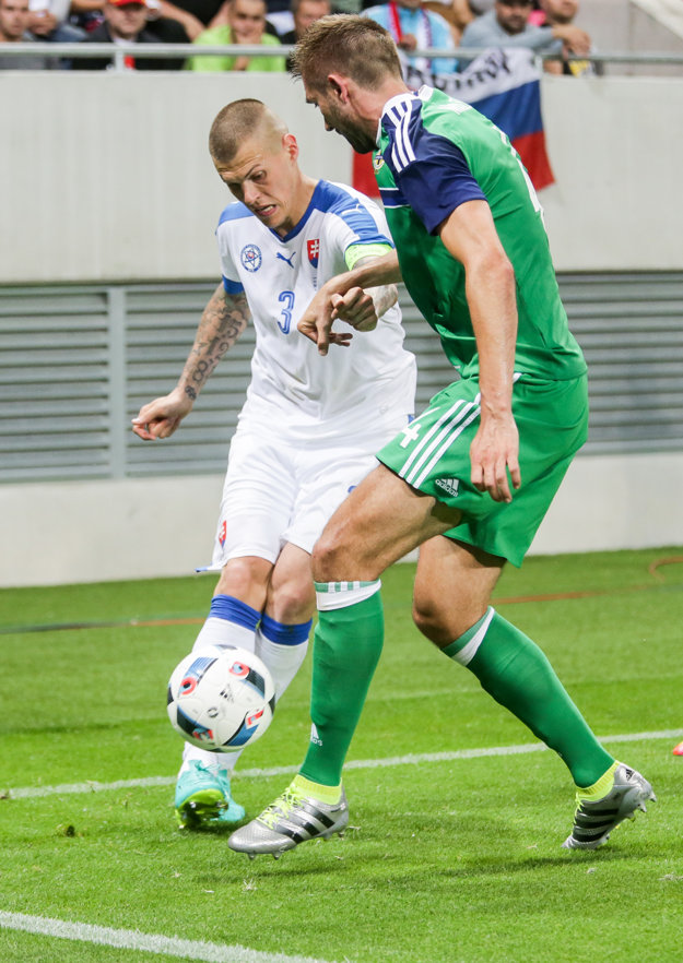 Martin Škrtel (vľavo) bol s výkonom spokojný.