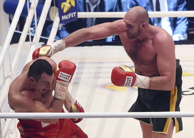 Posledný vzájomný súboj vyhral Tyson Fury (vpravo).