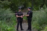 Ruskí policajti po zostrelení jedného z dronov neďaleko Moskvy. Ilustračná fotografia.