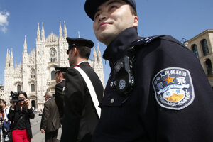 Príslušník čínskej polície. Ilustračná fotografia.