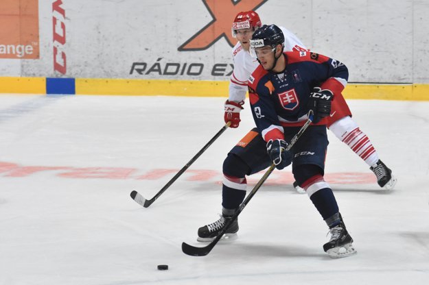 Slovenský reprezentant Christián Jaroš (vpreduň a Dán Nicolas Jensen (vzadu).