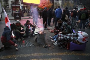 Protivládni demonštranti v Tbilisi.