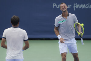 Slovensko-chorvátsky pár Filip Polášek (vpravo) a Ivan Dodig.