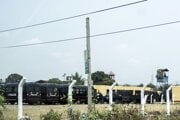 Policajné vozidlá v meste Kinshasa.