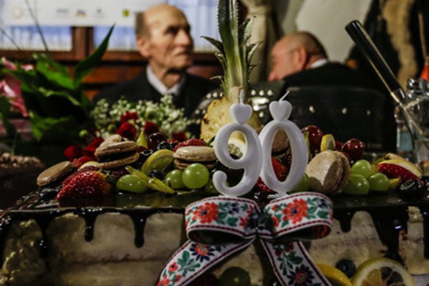 Štefan Nosáľ and his 90-th birthday cake.