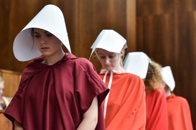 Activists protest silently against tougher abortion law in Slovak parliament, June 13.