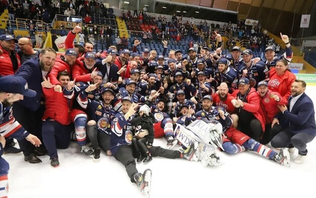 The HKM Zvolen ice hockey team poses for the traditional team shot after defeating HK Poprad and winning the championship trophy in the 2020/2021 season.
