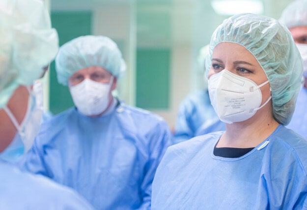 President Zuzana Čaputová (front) and Health Minister Vladimír Lengvarský (back) visiting Ružinov hospital