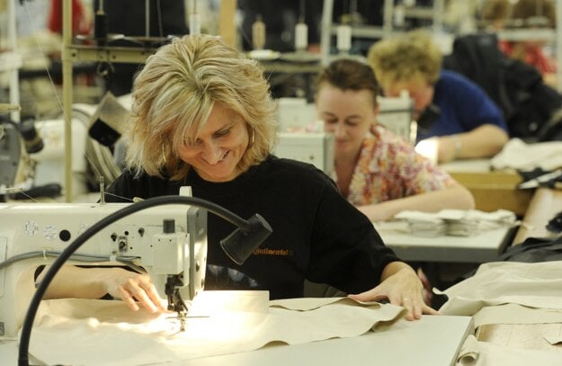 Women at sewing machines in the Makyta Púchov textile company in 2011.