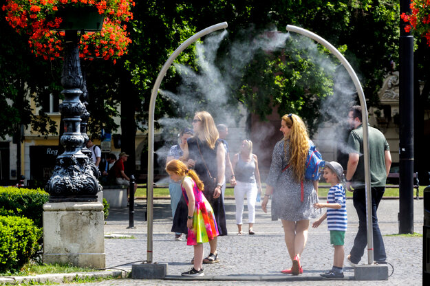 Mist and drinking fountains help people in Bratislava to tolerate hot weather.
