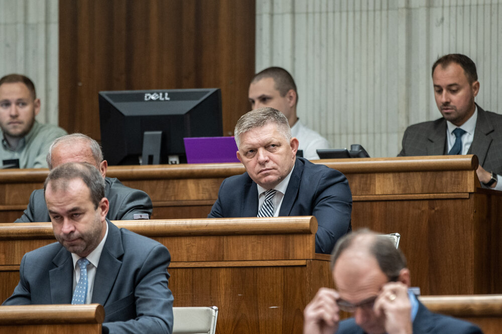 Former PM and and Smer chair Robert Fico (centre) sits in the debating chamber on September 29, 2022.