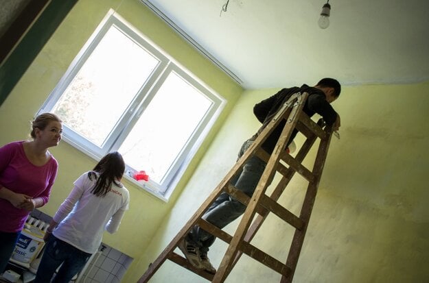 Painting rooms in a facility for children and adults with mental disabilities.