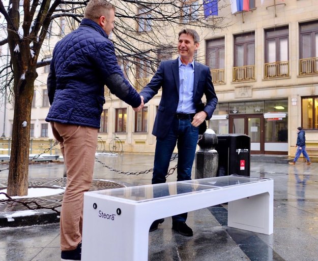 Bratislava Mayor Ivo Nesrovnal (right) and Igor Salopek of Power Mode introduced the smart bench.
