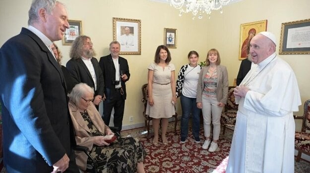 Pope Francis meets with the recalled archbishop Robert Bezák and his family. 