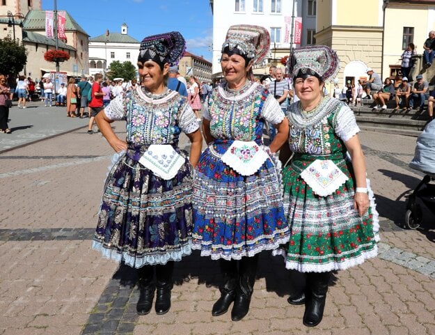 Women wear Slovak traditional costumes,