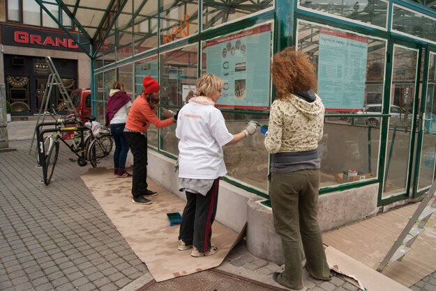 Painting St James' Chapel glasshouse.