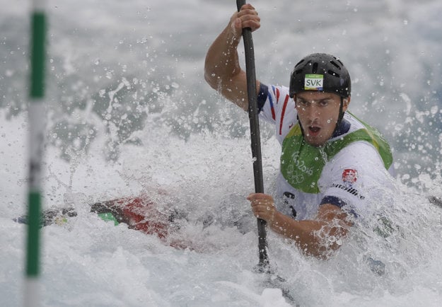 Grigar paddles hard in the semi-finals at Rio Olympics.