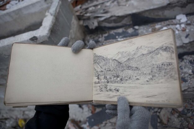 Juraj Gábor and his page from the sketch-book.