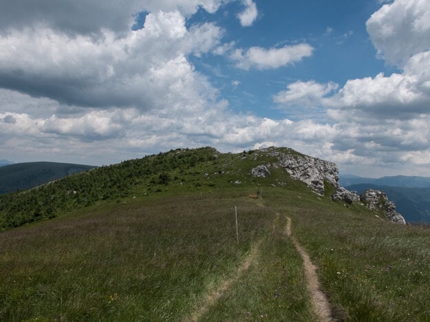 The impressive rocky Suchý Vrch peak and its surroundings are known as a home to protected plants such as blue gentian and edelweiss.