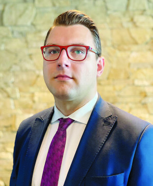 Michael Válek, junior associate