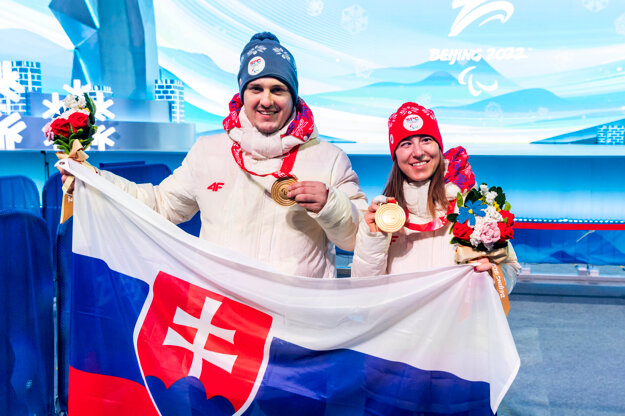 Para-skier Henrieta Farkašová (r) and her guide Martin Motyka after winning the gold medal in women's downhill on March 5.