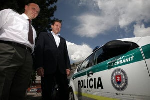 June 2011. Police Corps President Jaroslav Spišiak and Interior Minister Daniel Lipšic present new logo "Help and protect" that will be located at police vehicles.