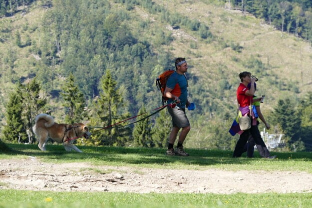 Tourists walk the Veľká Rača peak in the Kysuce region.