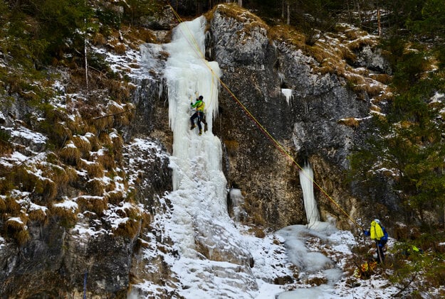 Climbers conquer an icefall near the Letanovce Mill in the Prielom Hornádu canyon, eastern Slovakia, on January 26, 2022.