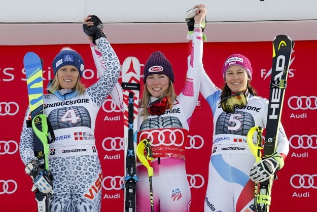 Winner, US Mikaela Shiffrin (C), second, Slovak Veronika Velez Zuzulová (L) and third, Swiss Wendy Holdener, celebrate after World Cup slalom in Sistriere.