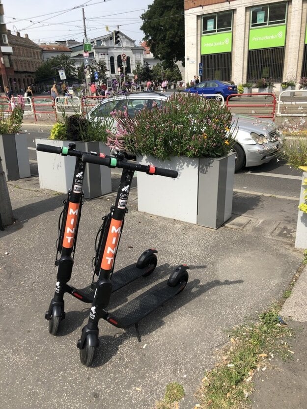 Mint e-scooters near the Old Market in Bratislava.