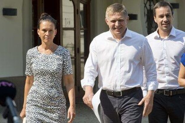 PM Fico (Centre) and his wife Svetlana react to accusation.