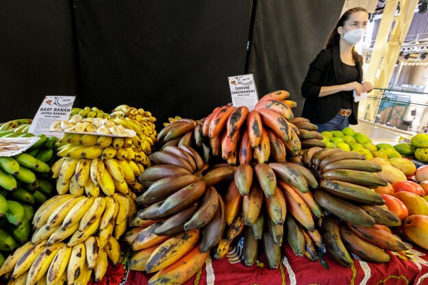 A woman sells bananas during the African Markets in Bratislava on November 20, 2021.