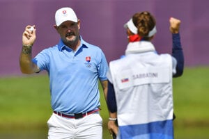 Rory Sabbatini and his caddy - his wife Martina - are happy after the last strike.