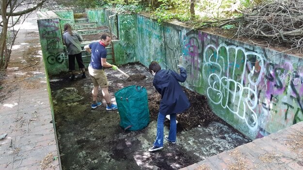 Volunteers clean up the neglected Koch Garden in Bratislava.
