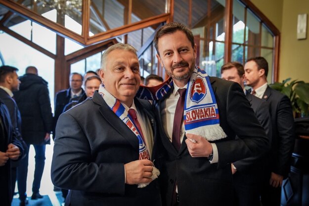 Viktor Orbán and Eduard Heger with a new scarf.