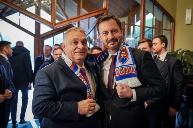 Viktor Orbán and Eduard Heger with a new scarf. 