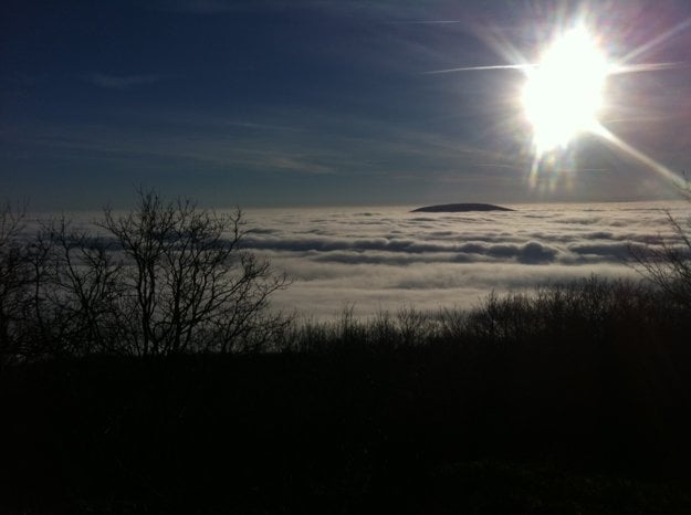 The view from the top of Devínska Kobyla with the Danube River below the inversion cap.