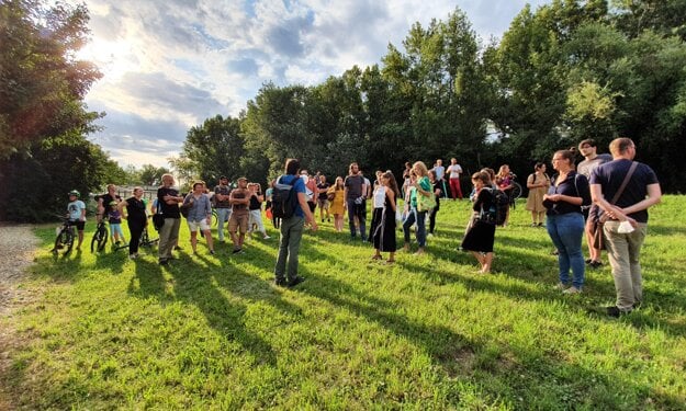 The guided walk drew tens of people.