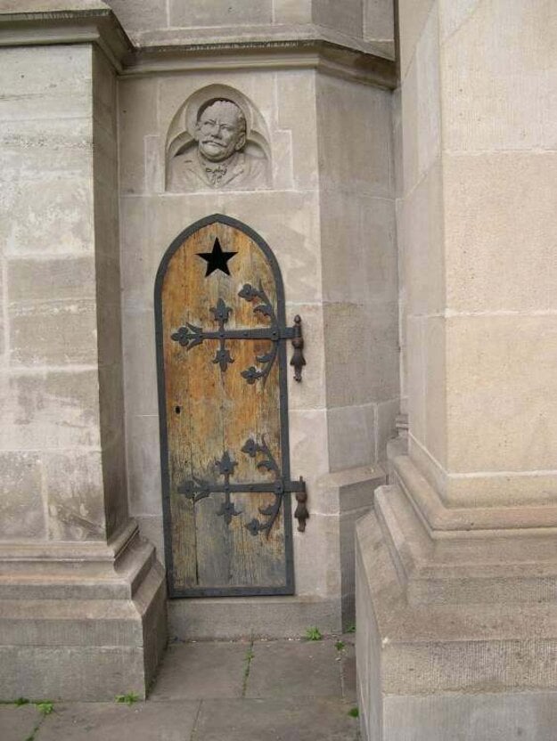 The portrait of Joseph Weber above the side door to St. Elisabeth Cathedral.