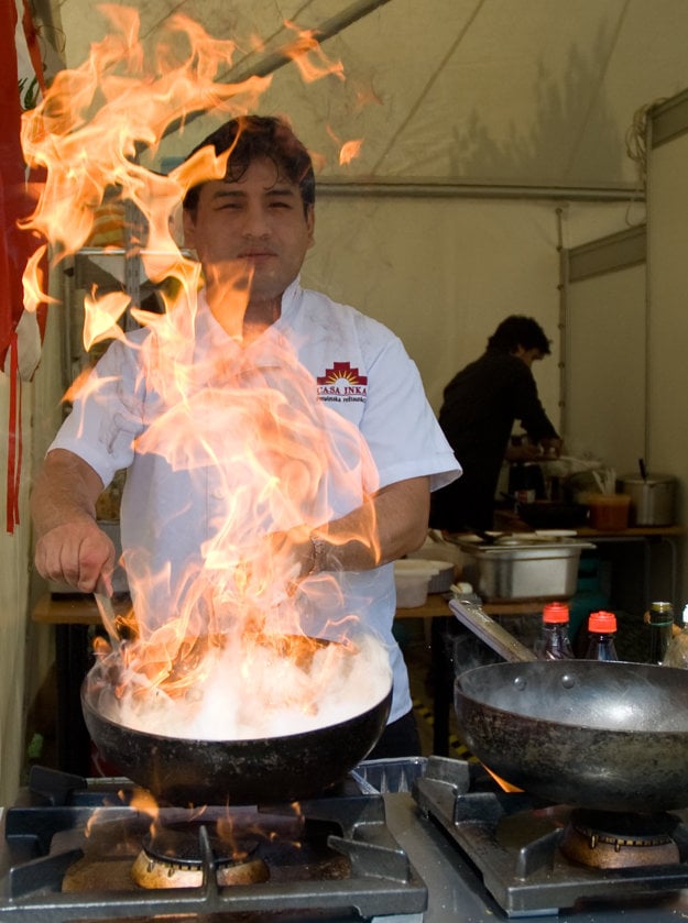 A chef demonstrating his cooking skills.