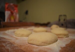 Circles cut out from dough.