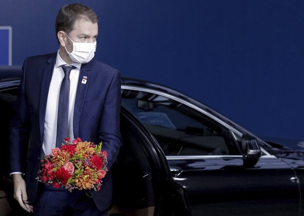 PM Igor Matovič arrives at the EU summit in Brussels on October 16. He has also had a bilateral meeting with German Chancellor Angela Merkel.