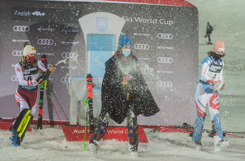 Petra Vlhová (centre) celebrates after winning the women's World Cup Slalom, in Zagreb, Croatia.