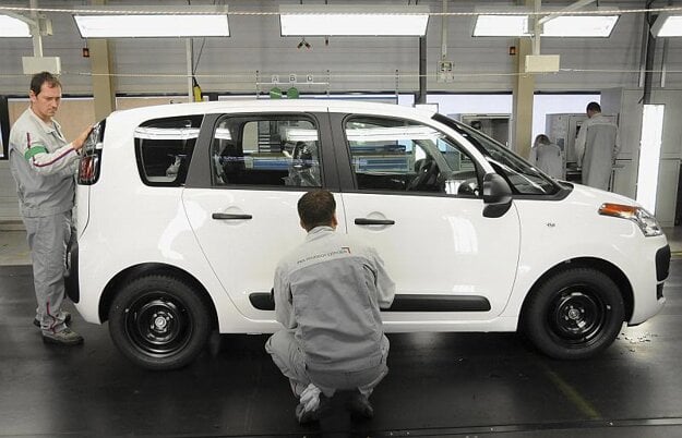 Employees work on the new Citroen C3 Picasso in the PSA Peugeot Citroen Slovakia plant in Trnava.
