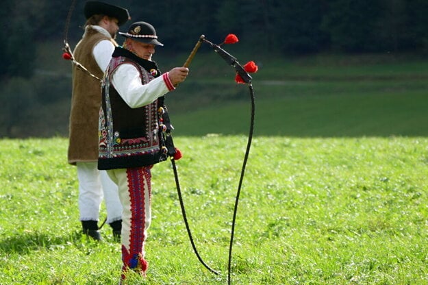 A man holds a whip during a whipping school weekend on October 4, 2020 in Čičmany.