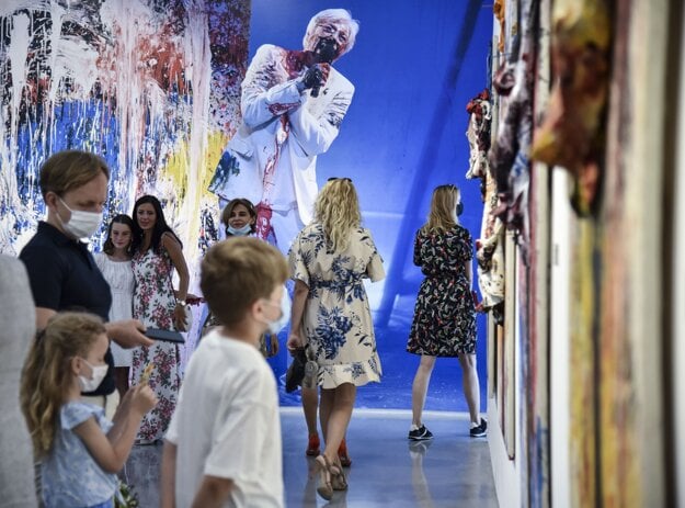 People look at the exhibited works of Juraj Kukura on June 27, 2020.